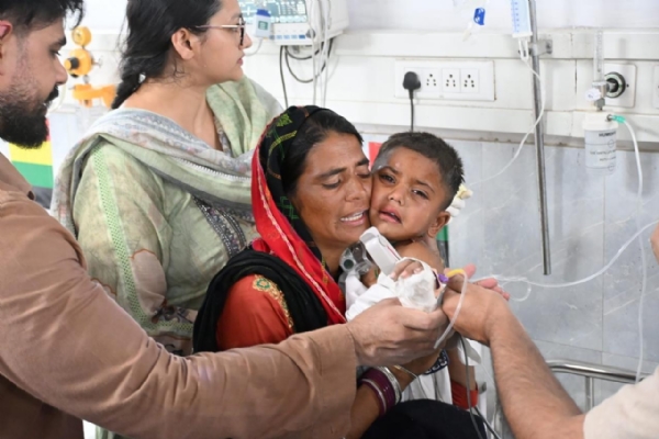 Gurkaran Singh with his mother Asha in hospital Gurkaran Singh with his mother Asha in hospital