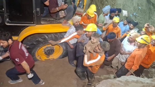 NDRF team taking Gurkaran Singh after rescue NDRF team taking Gurkaran Singh after rescue