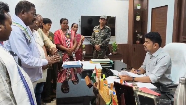Villagers meet with collector Villagers meet with collector