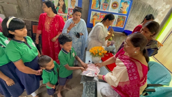 Utensils distribution by Naba Das